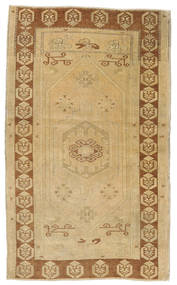  Taspinar Teppe 108X180 Ekte Orientalsk Håndknyttet Mørk Beige/Lysbrun (Ull, Tyrkia)